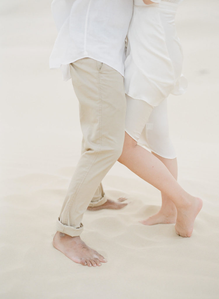 engagement shoot barefoot in the sand dunes