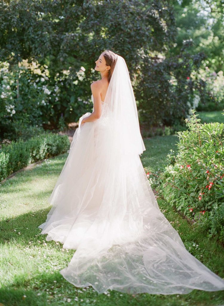 brides gown and veil from the back
