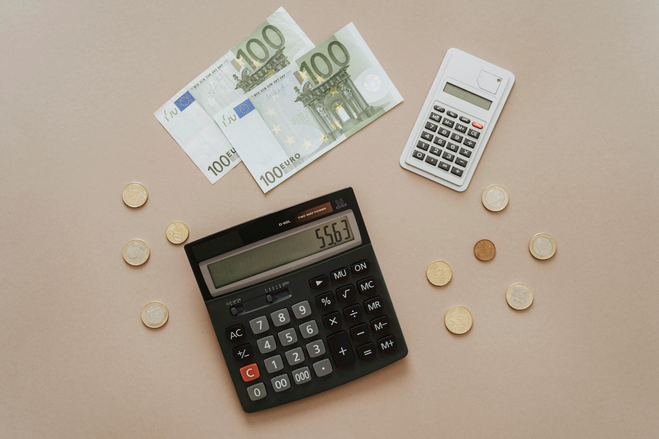 Aerial photo of a calculator and money